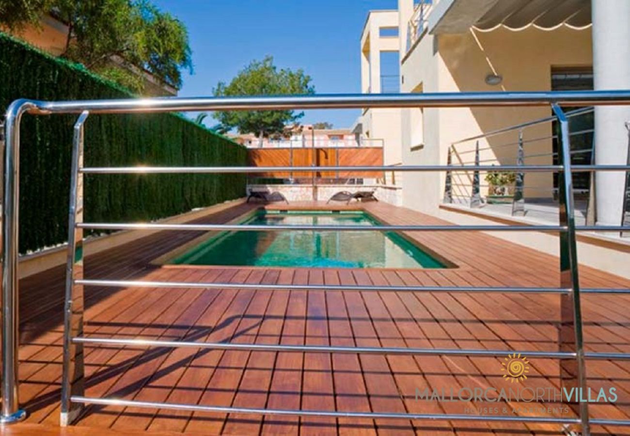 Villa en Platja de Muro - Villa Mediterranean: Moderno Refugio Familiar a Pa Villa en Platja de Muro - Villa Mediterranean: Moderno Refugio Familiar a Pa