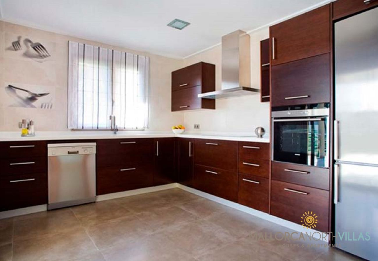 Villa en Platja de Muro - Villa Mediterranean: Moderno Refugio Familiar a Pa Villa en Platja de Muro - Villa Mediterranean: Moderno Refugio Familiar a Pa