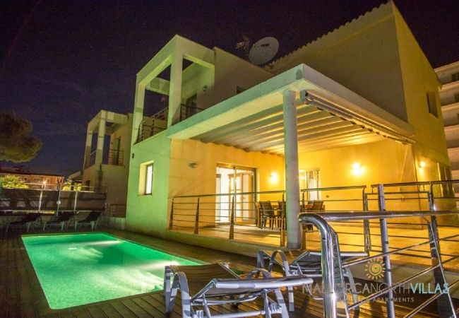 Illuminated private pool and night terrace at Villa Mediterranean